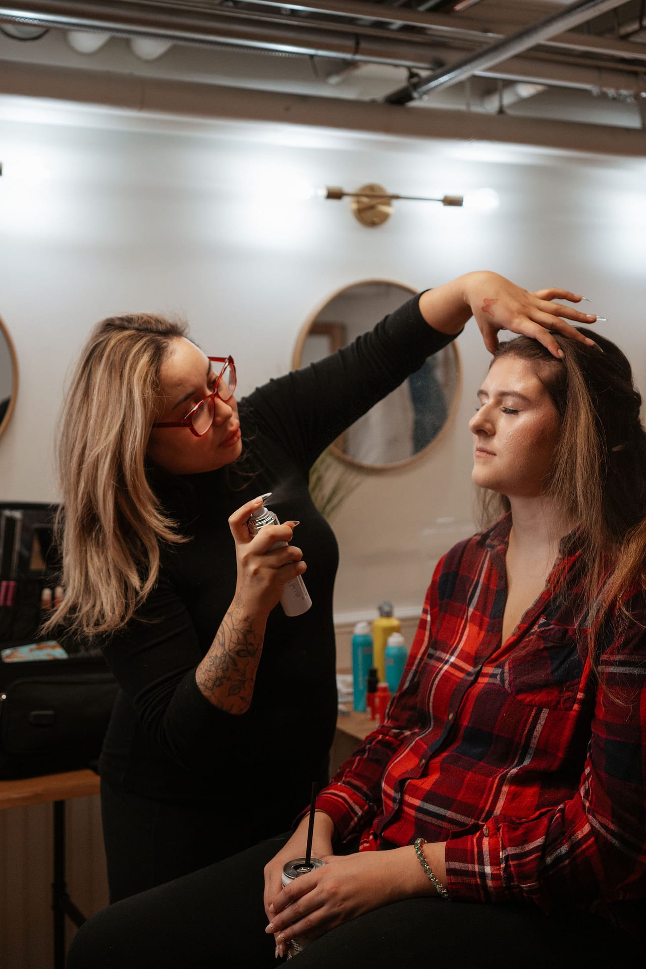 makeup artist setting bride's face