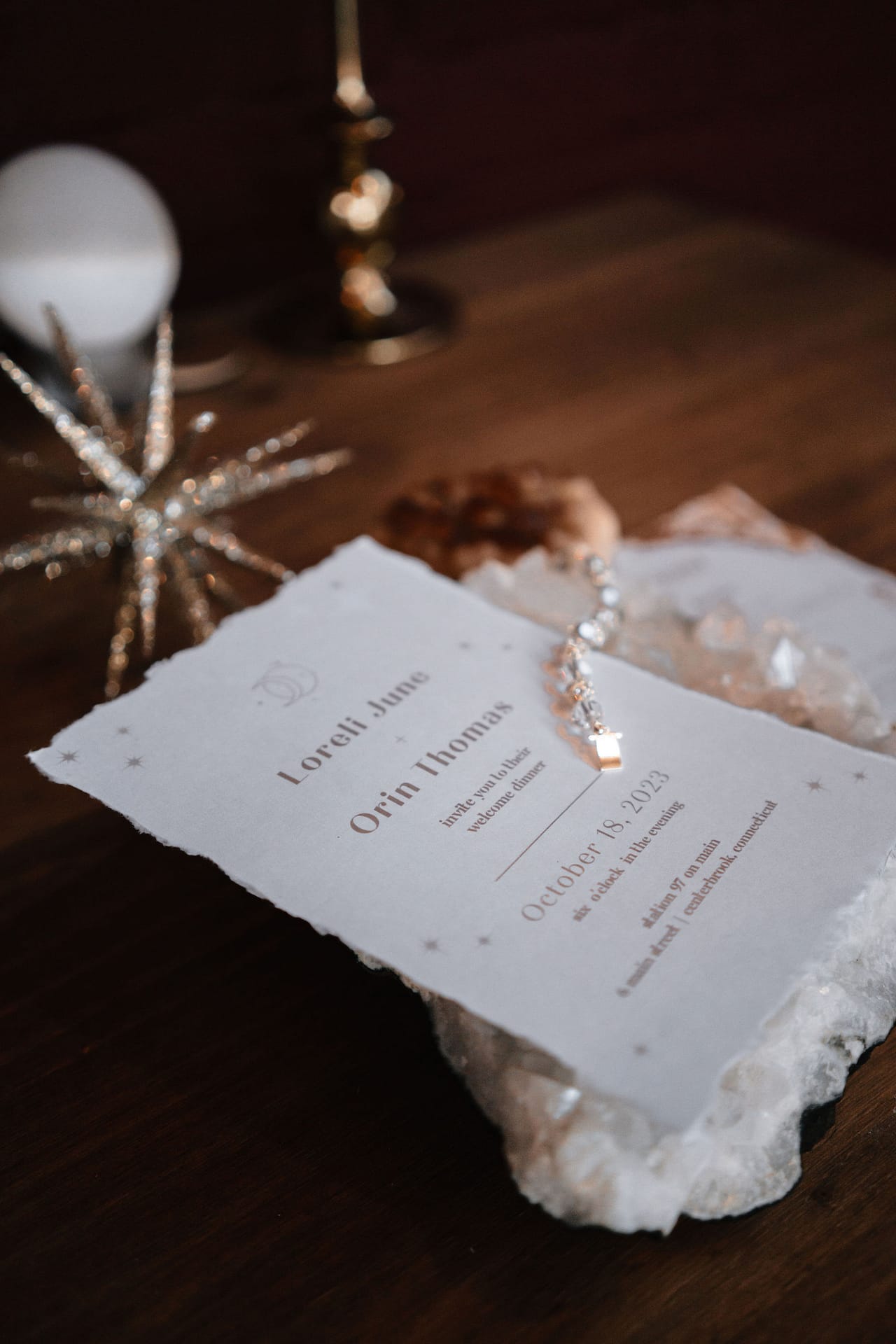 detail shot of wedding invite in crystal