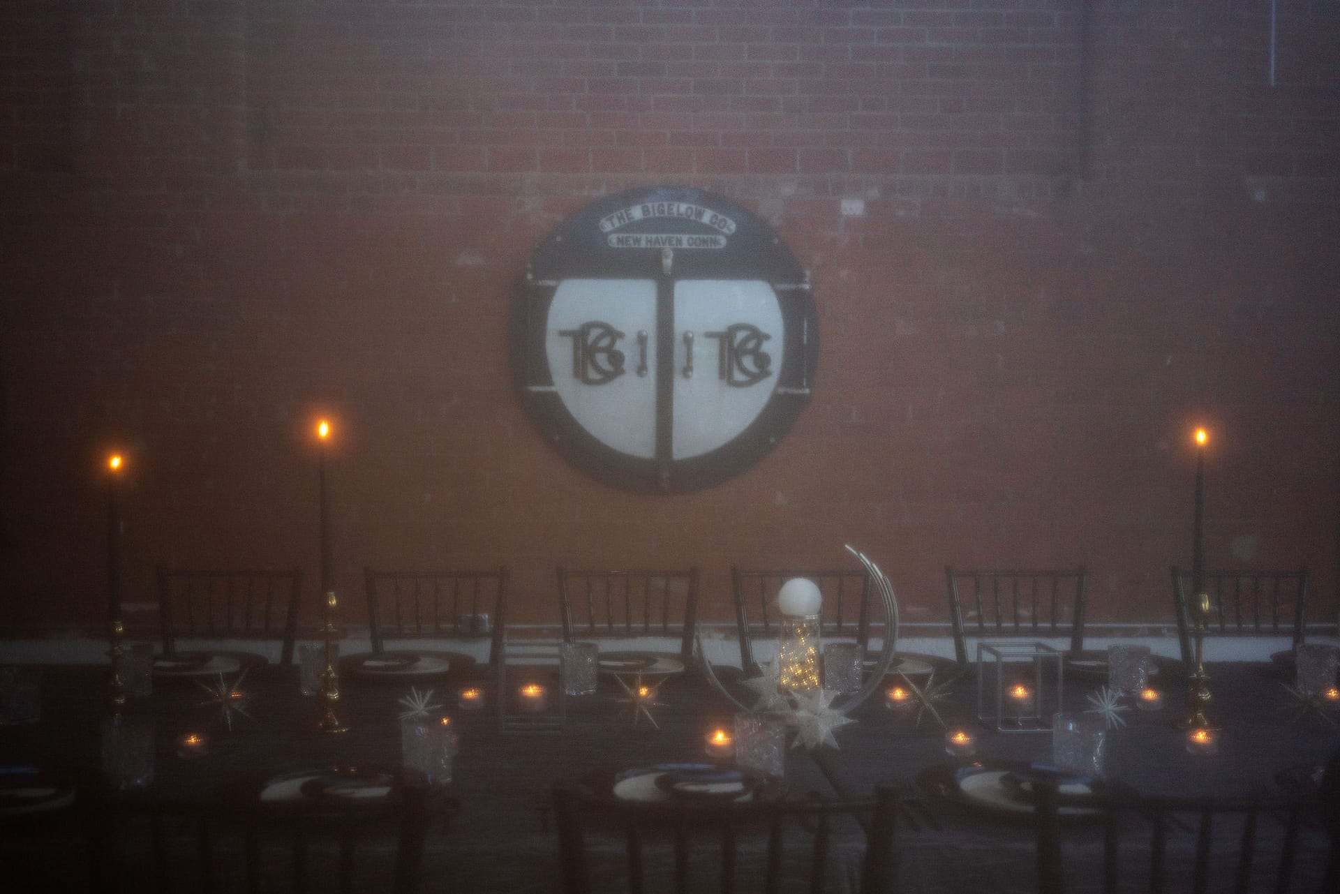wedding venue sign behind reception table