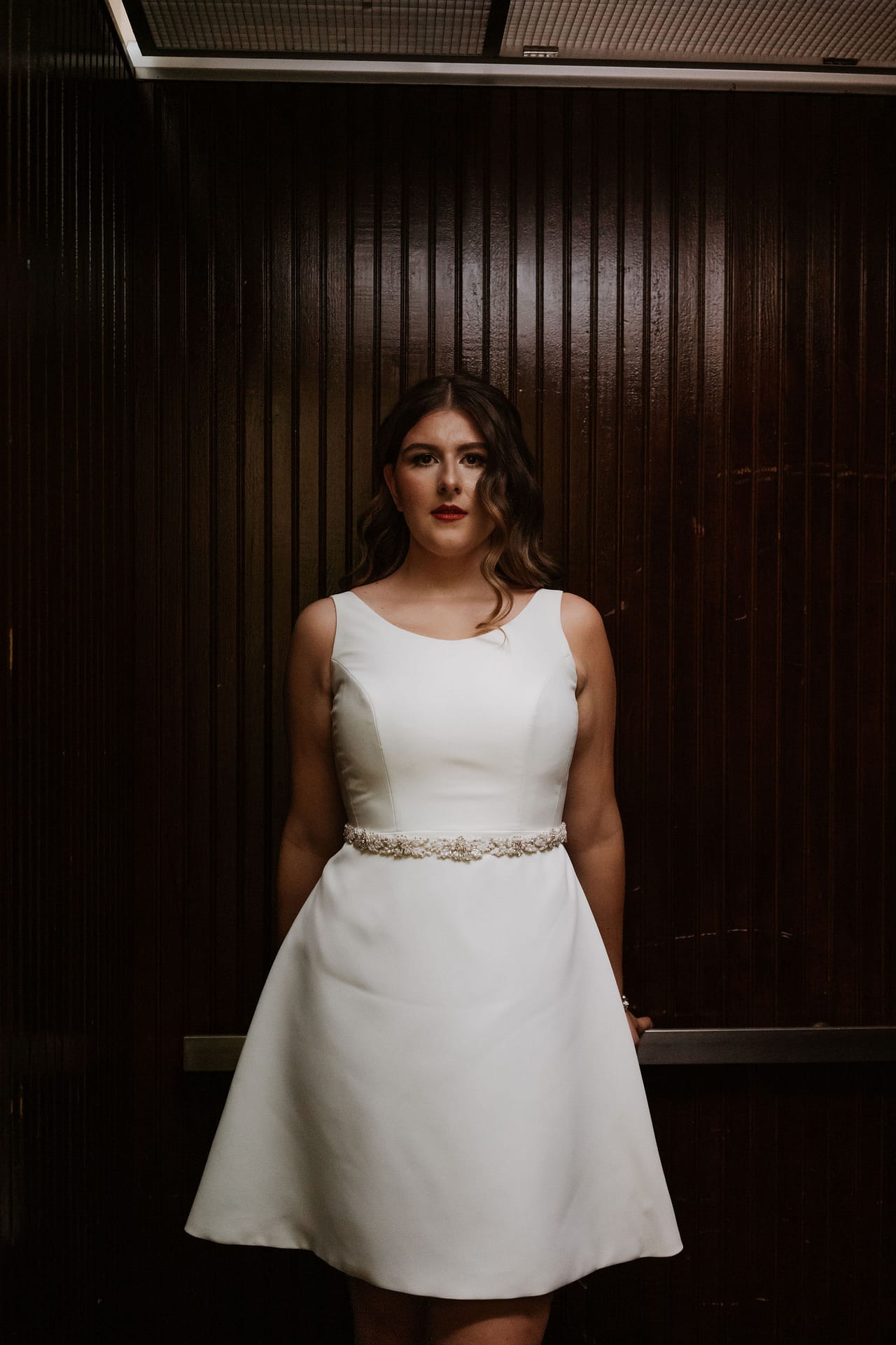 bride getting off elevator