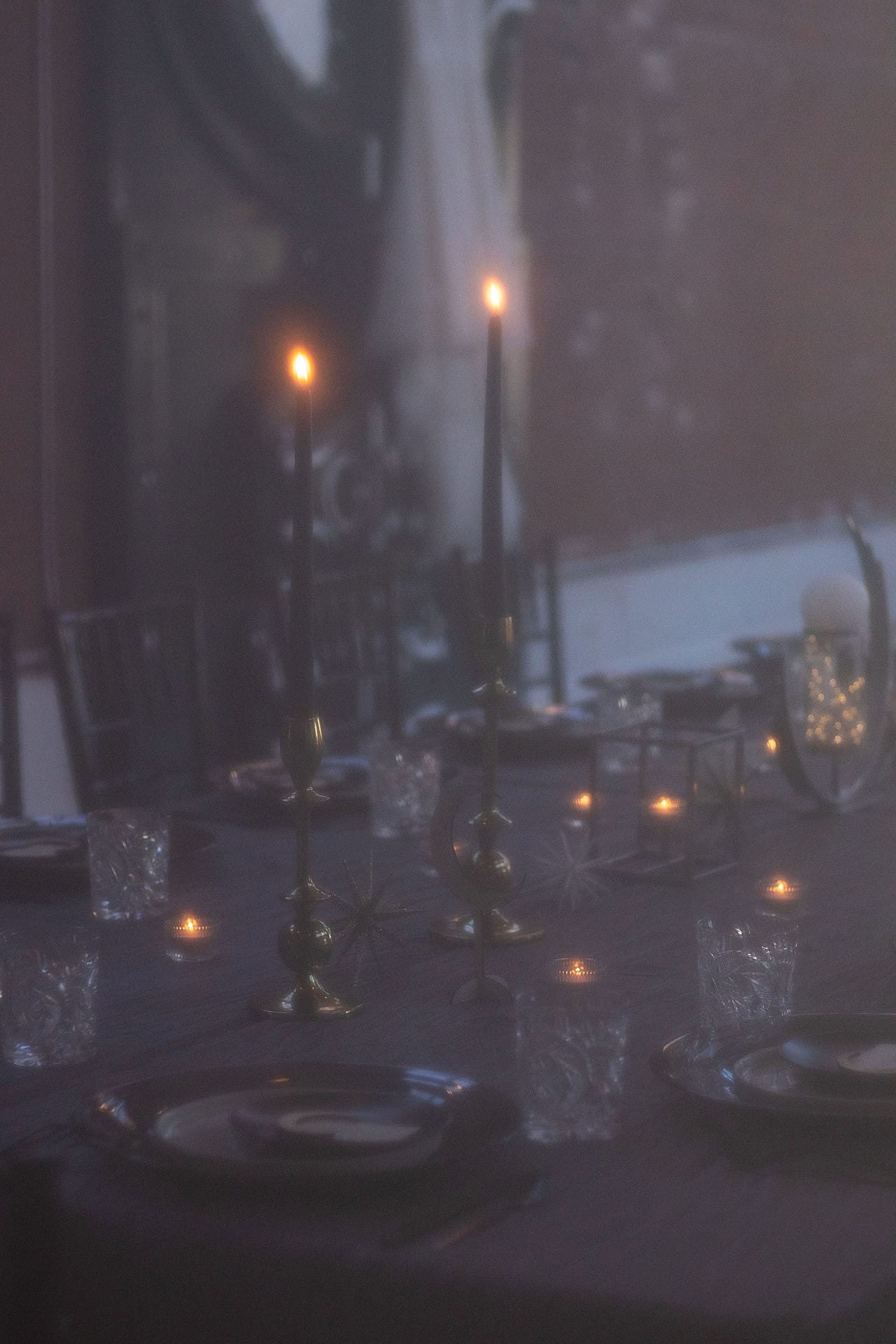 candles on wedding reception table with moon and star theme